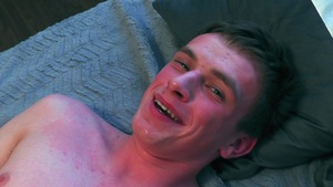 Shy dude with a bubble pooper getting poked on a bed